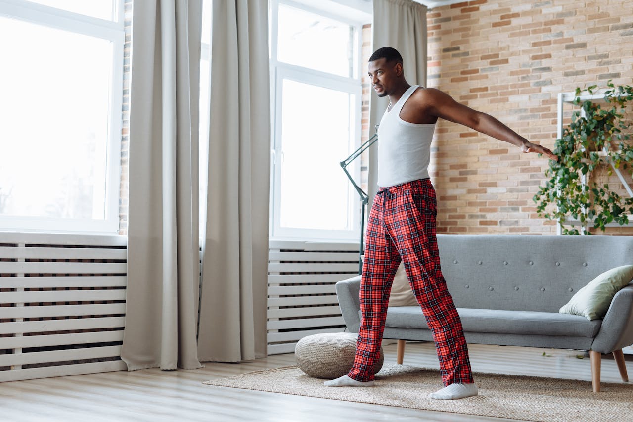 A Man Stretching His Arms